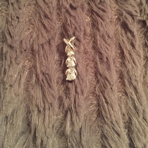 Silver and diamond charm