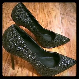Black glitter pumps.