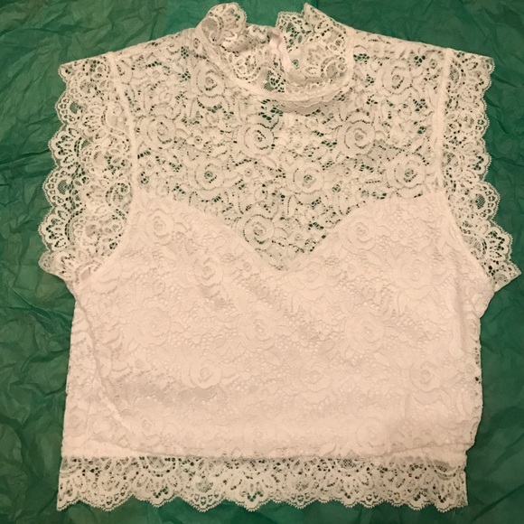 Beautiful white lace Bebe crop top
