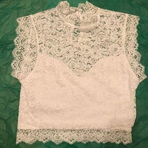 Beautiful white lace Bebe crop top