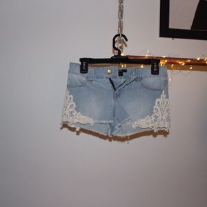 Light was jean shorts