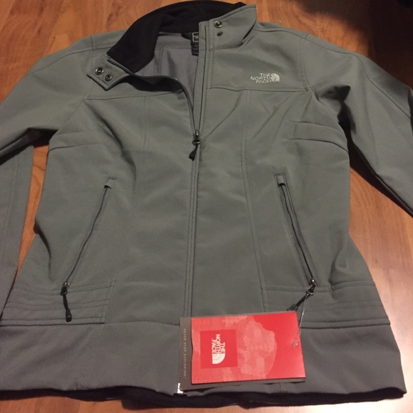Selling grey north face jacket