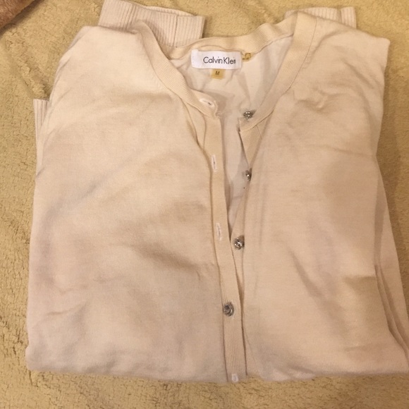 Beige cardigan with rhinestone buttons