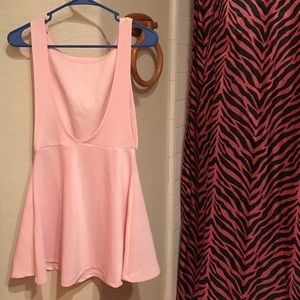 back-showing pastel pink dress