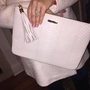 Never worn Gigi New York clutch