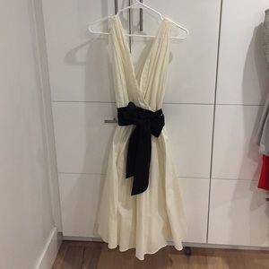 Odille Cream dress with black sash belt