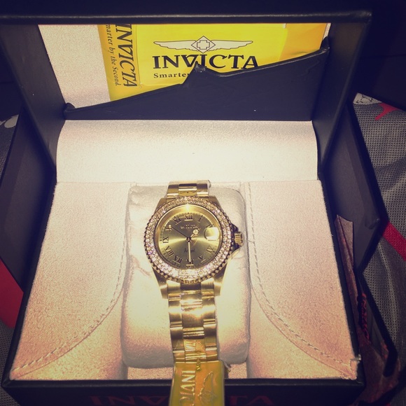 Invicta women gold watch