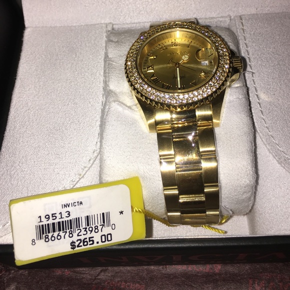 Invicta women gold watch