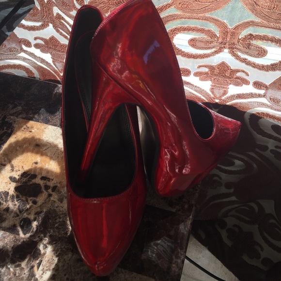 8 1/2 five inch red platform stilettos by Liliana