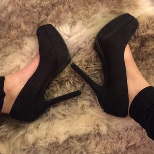 Black faux suede pumps
