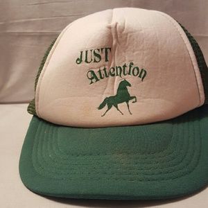 Green hat with a horse and writing