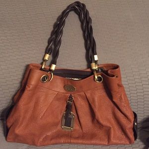 Brown handbag with woven handles