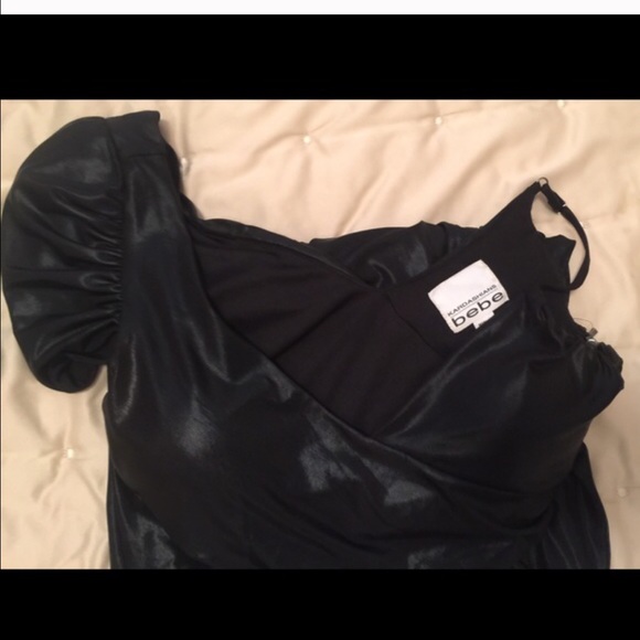Beautiful like new bebe unique dress. Very sexy on - Picture 3 of 4