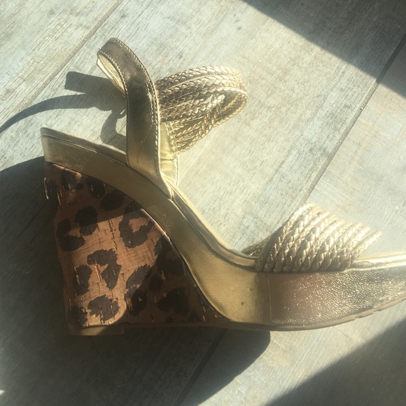 BCBG Size 7 gold metallic wedges with cork