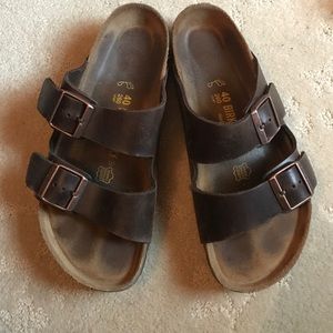 Brown and rose gold Birkenstocks