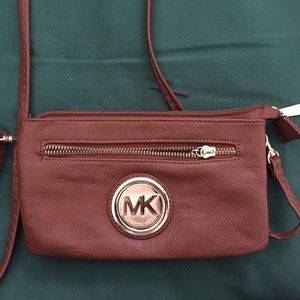 Small MK brown leather cross body bag