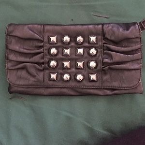 Black studded clutch