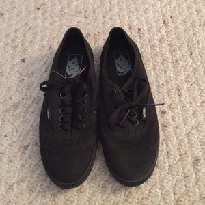 Black Vans sneakers