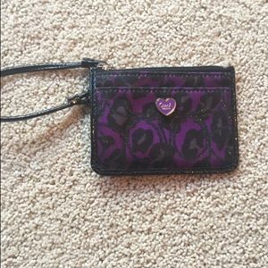 Hand held COACH Wristlet; Dark purple $10