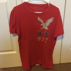 orange/red colored American Eagle Outfitters shirt