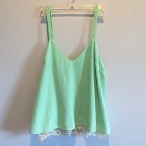 Green Tobi tank top blouse with white lace trim
