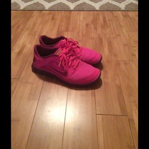 Pink Nike Livestong tennis shoes