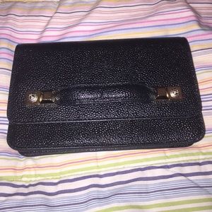 Henri Bendel black leather Clutch