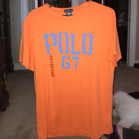 Orange Polo T shirt. Never worn. Size XL (18-20)