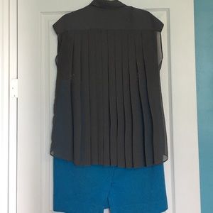 Sheer and flowy blouse.