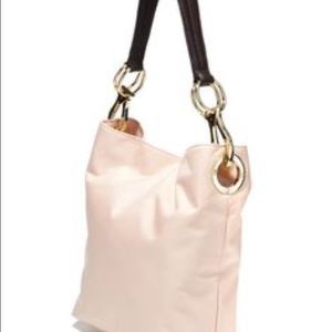 Off white purse w/ leather handle & gold metal det