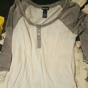 three different colored baseball tees,