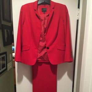 Red pant suit in perfect condition.