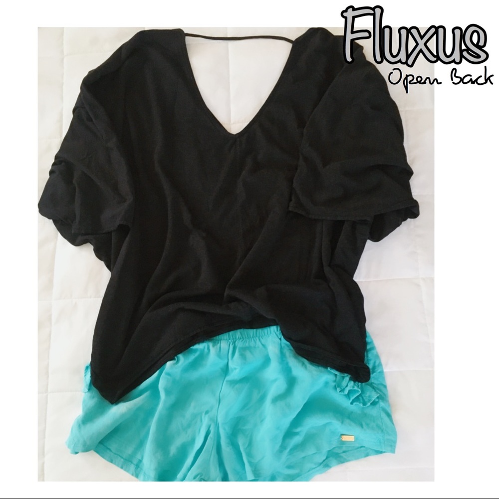 | | FLUXUS | | Open Back Cape Sleeve Top