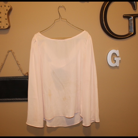 Light pink blouse with criss cross back