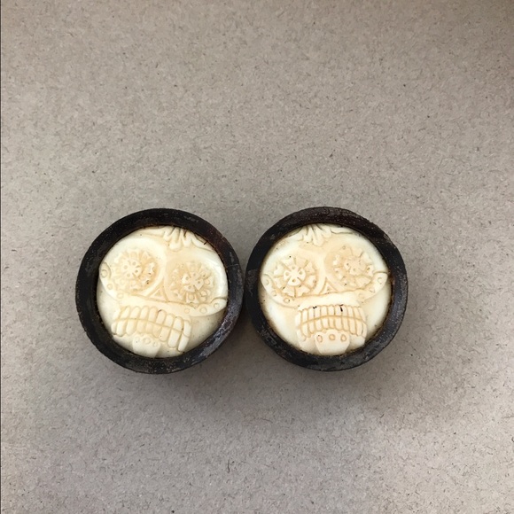 1 1/4th inch wood and bone gauges/plugs