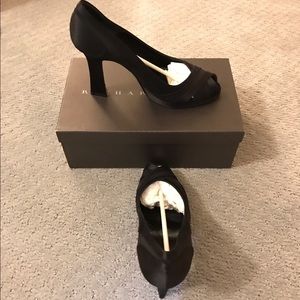 Black peep toe pumps
