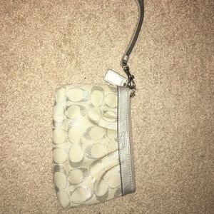 White & silver coach wristlet