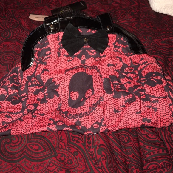 Brand new iron fist purse red skulls fishnet print
