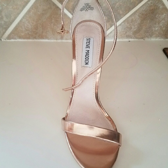 Won once. Steve Madden ankle strap  sandals.