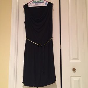 black dress with gold braid belt