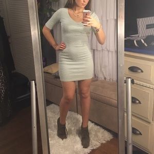 Tight fitting light green dress