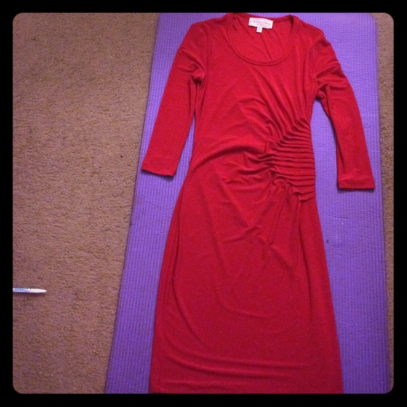 An xs dress with stretch. Red in color