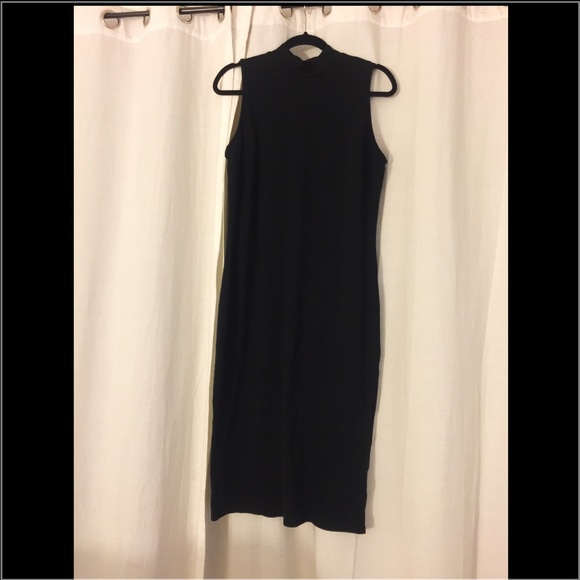 Black sleeveless turtle neck dress