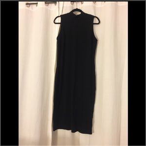 Black sleeveless turtle neck dress