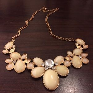 White/cream chunky necklace to spice up your look!