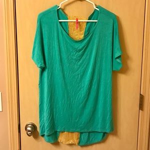 Classy green blouse with gold sequin cross in back