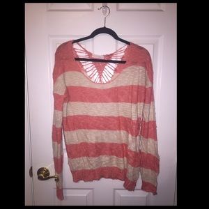 Pink and white knitted sweater