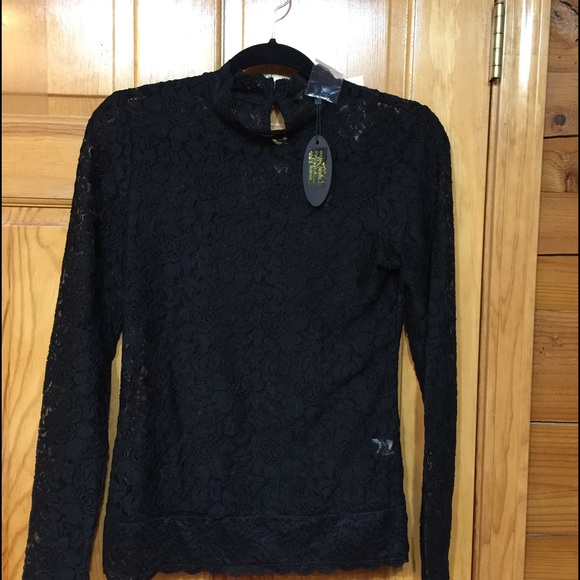 NWT Lace black shirt . Very cute.