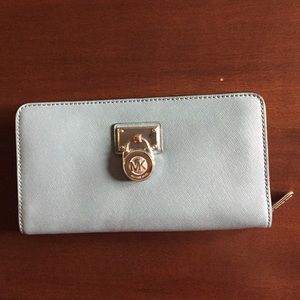 Light blue Michael Kors wallet.
