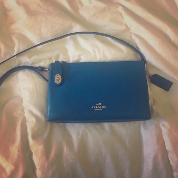 Blue cross body Coach purse
